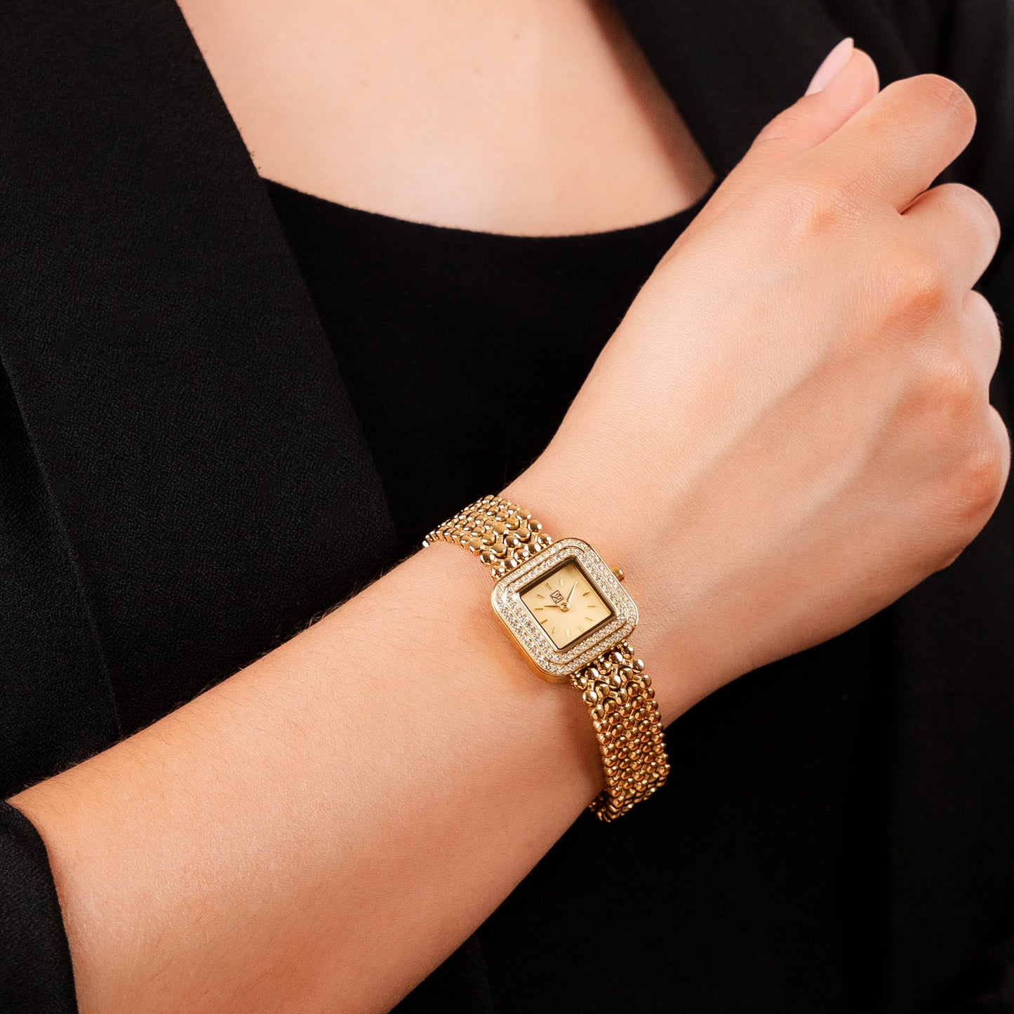 Reloj Cloe Análogo para Dama con Doble Pedrería en Bisel y Extensible de Acero Inoxidable OE2543
