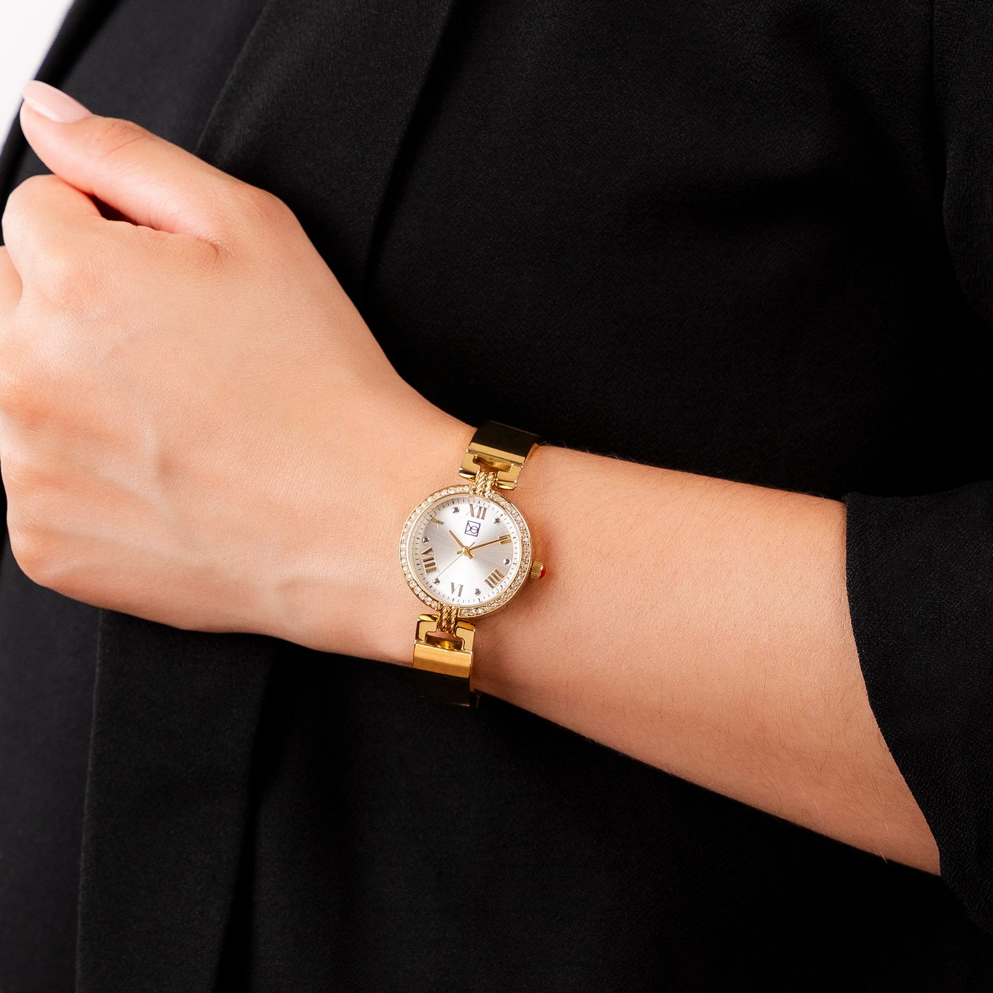 Reloj Cloe Análogo para Dama con Pedrería en Bisel y Extensible de Acero Inoxidable OE2533