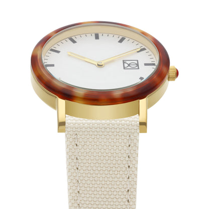 Reloj Cloe Análogo para Dama con Bisel Carey y Correa de Textil OE2546
