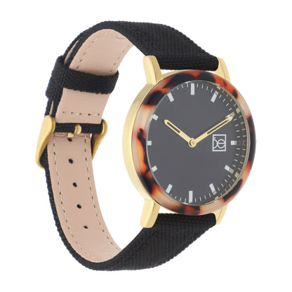 Reloj Cloe Análogo para Dama con Bisel Carey y Correa de Textil OE2546