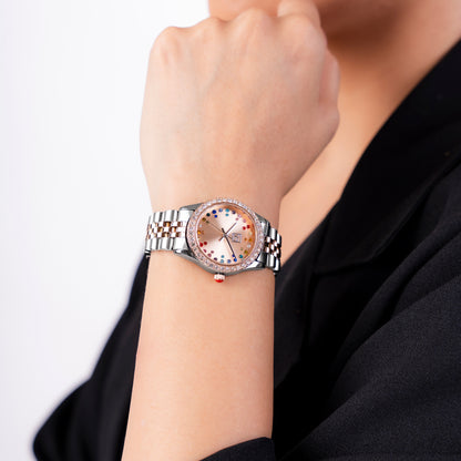 Reloj Cloe Análogo para Dama con Pedrería Multicolor en Indicadores y Extensible de Acero Inoxidable OE2609