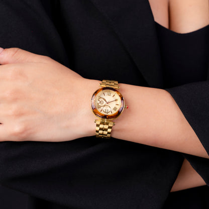 Reloj Cloe Análogo para Dama con Bisel Acabado Carey y Extensible de Acero Inoxidable OE2615