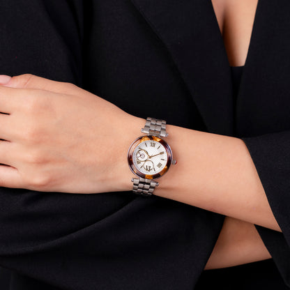 Reloj Cloe Análogo para Dama con Bisel Acabado Carey y Extensible de Acero Inoxidable OE2615