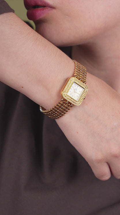 Reloj Cloe Análogo para Dama con Doble Pedrería en Bisel y Extensible de Acero Inoxidable OE2543